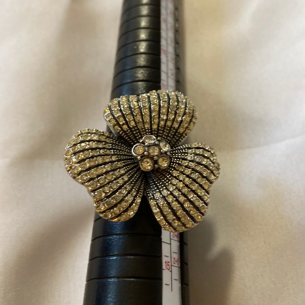 The fashion jewelry ring goes up to size 13 because it is adjustable